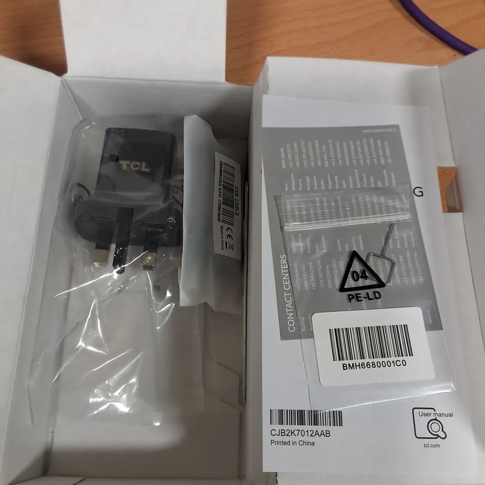 BOXED TCL 40 R5G 64GB IN STARLIGHT BLACK - T771K