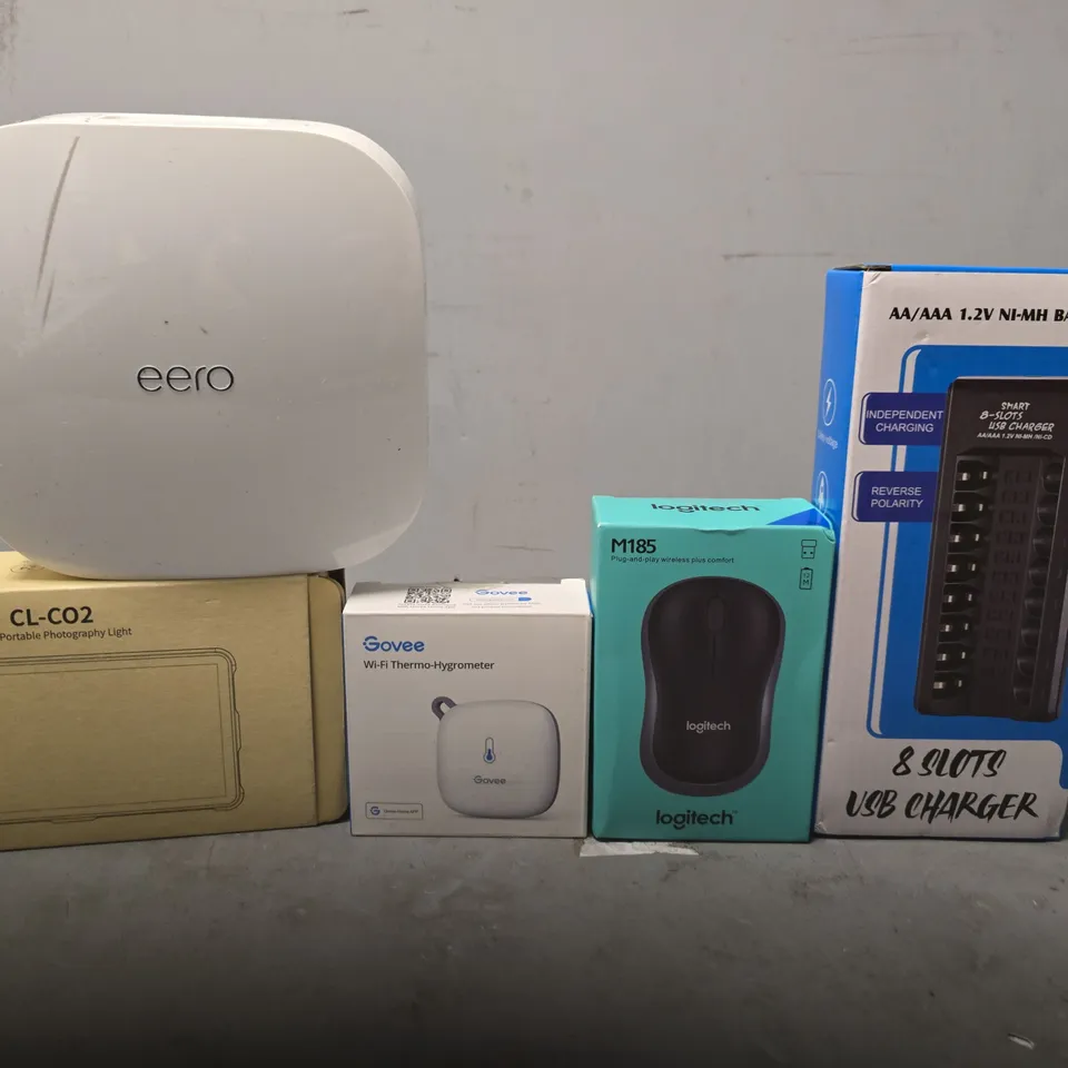 TOTE OF APPROXIMATELY 12 ASSORTED ITEMS TO INCLUDE - EERO PRO 6 , LOGITECH M185 MOUSE , 8 SLOTS USB CHARGER ETC