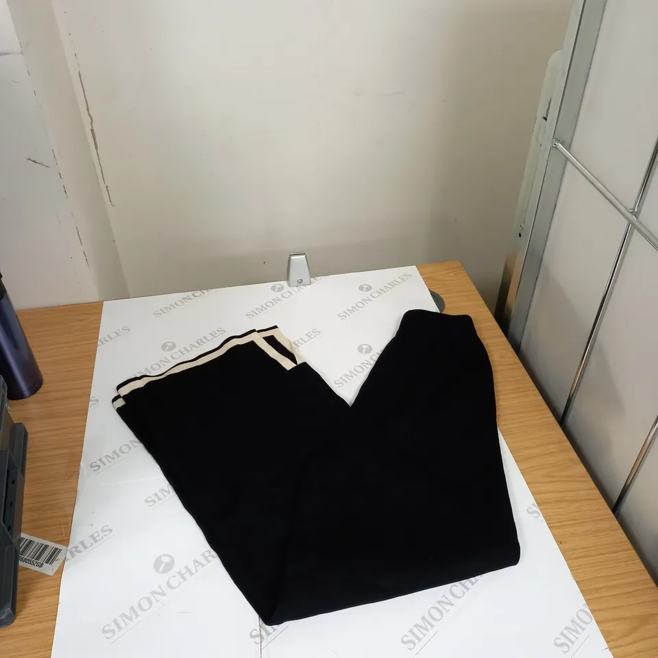 BOX OF ASSORTED CLOTHING ITEMS TO INCLUDE TROUSERS, TOPS, HATS ETC