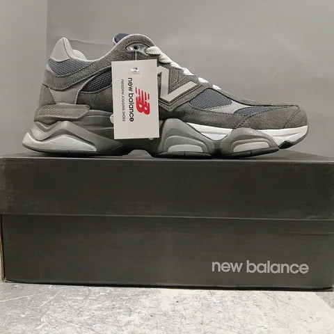 BOXED PAIR OF NEW BALANCE 9060 TRAINERS IN GREY/NAVY SIZE UK 9