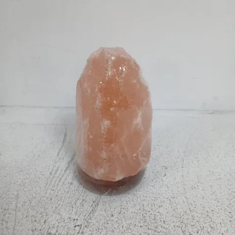 ORANGE HIMALAYAN SALT LAMP ON ROUND WOODEN BASE