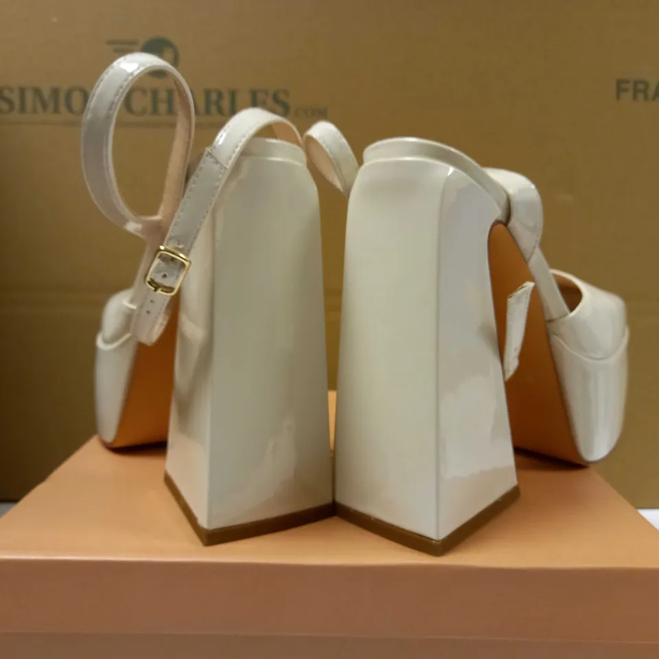 BOXED PAIR OF SIMMI CREAM PLATFORM HEELS - SIZE 4
