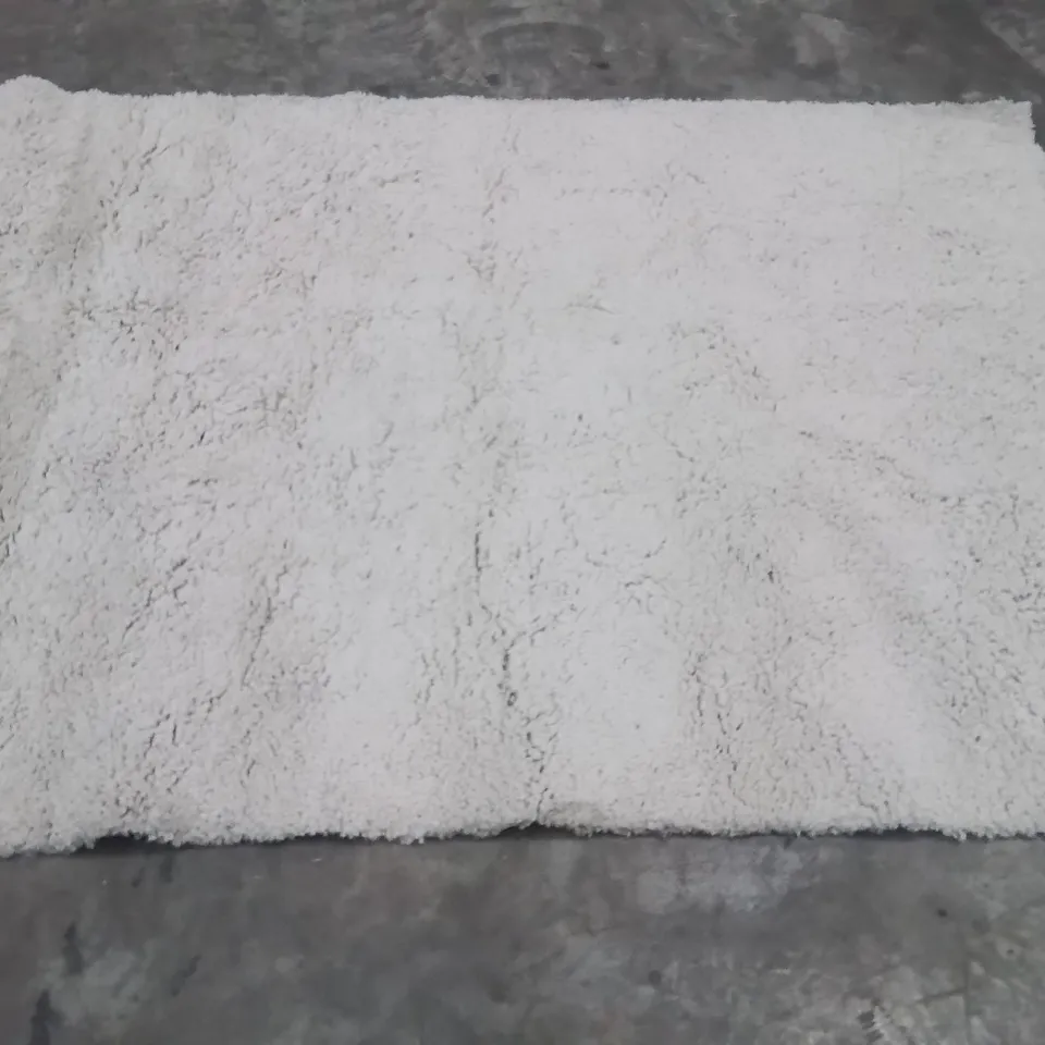 STILLAGE  OF APPROXIMATELY 15 QUALITY DESIGNER RUGS