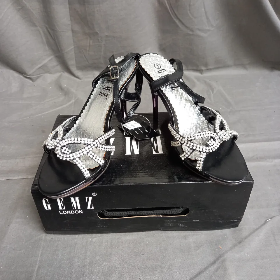 BOX OF APPROX 12 PAIRS OF GEMS RHINESTONE STRAP HEELS IN BLACK - VARIOUS SIZES