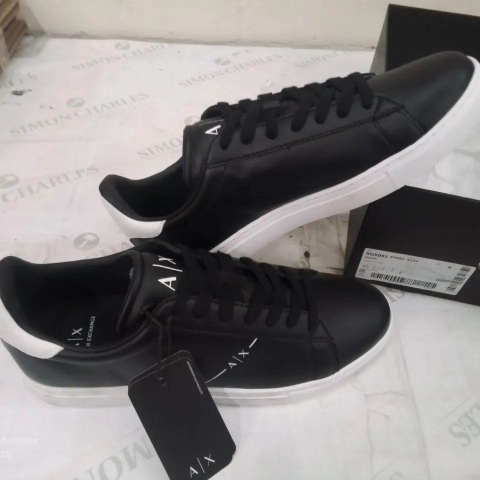 BOXED PAIR OF ARMANI EXCHANGE SIZE NINE BLACK TRAINERS.