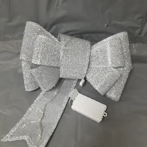 BATTERY OPERATED DOOR BOW
