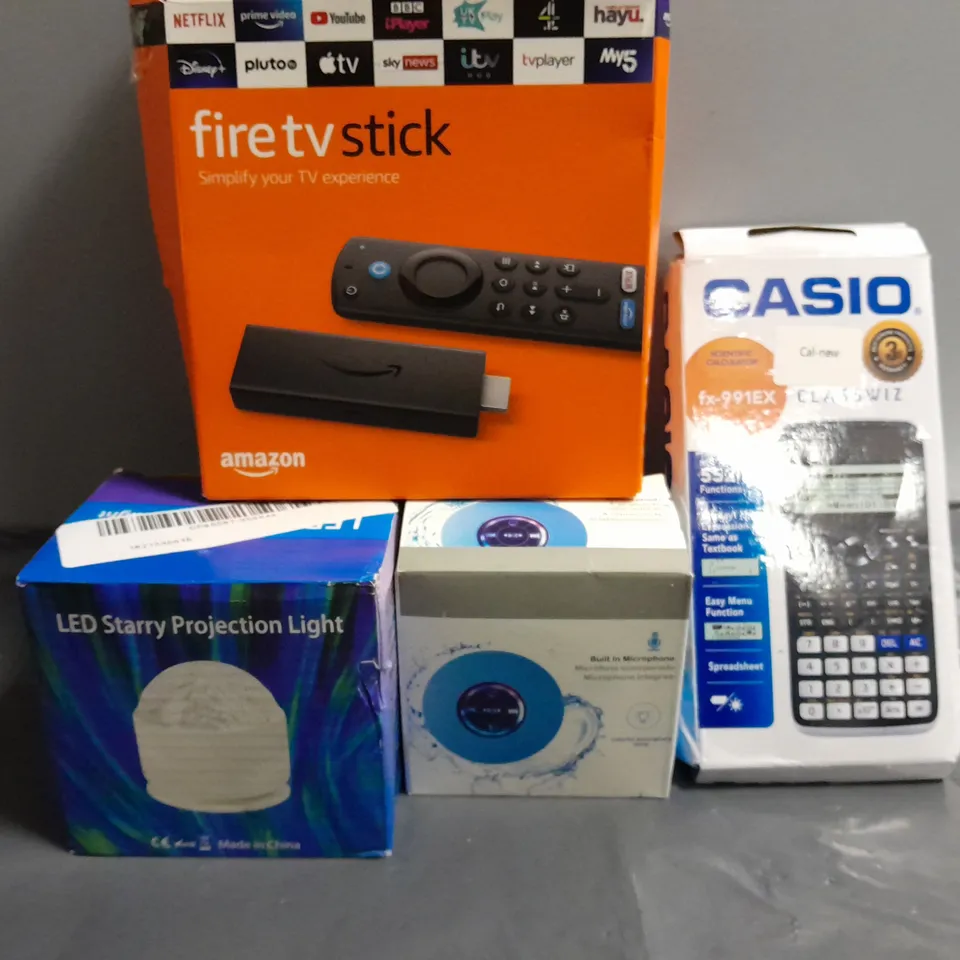 APPROXIMATELY 6 ASSORTED ITEMS TO INCLUDE - CASIO CALCULATOR , FIRE TV STICK , WATERPROOF SPEAKER ETC