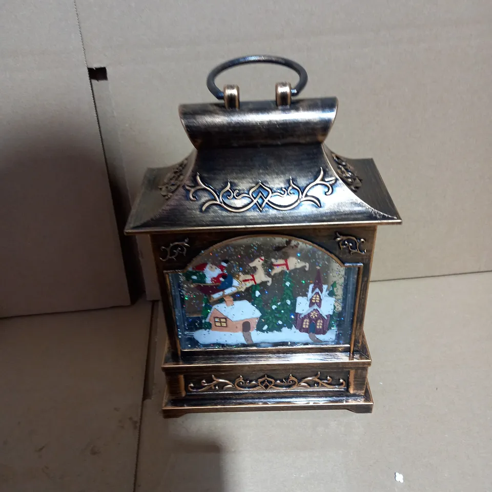 FESTIVE PRE-LIT MUSICAL WATER SPINNER WITH SWIRLING GLITTER