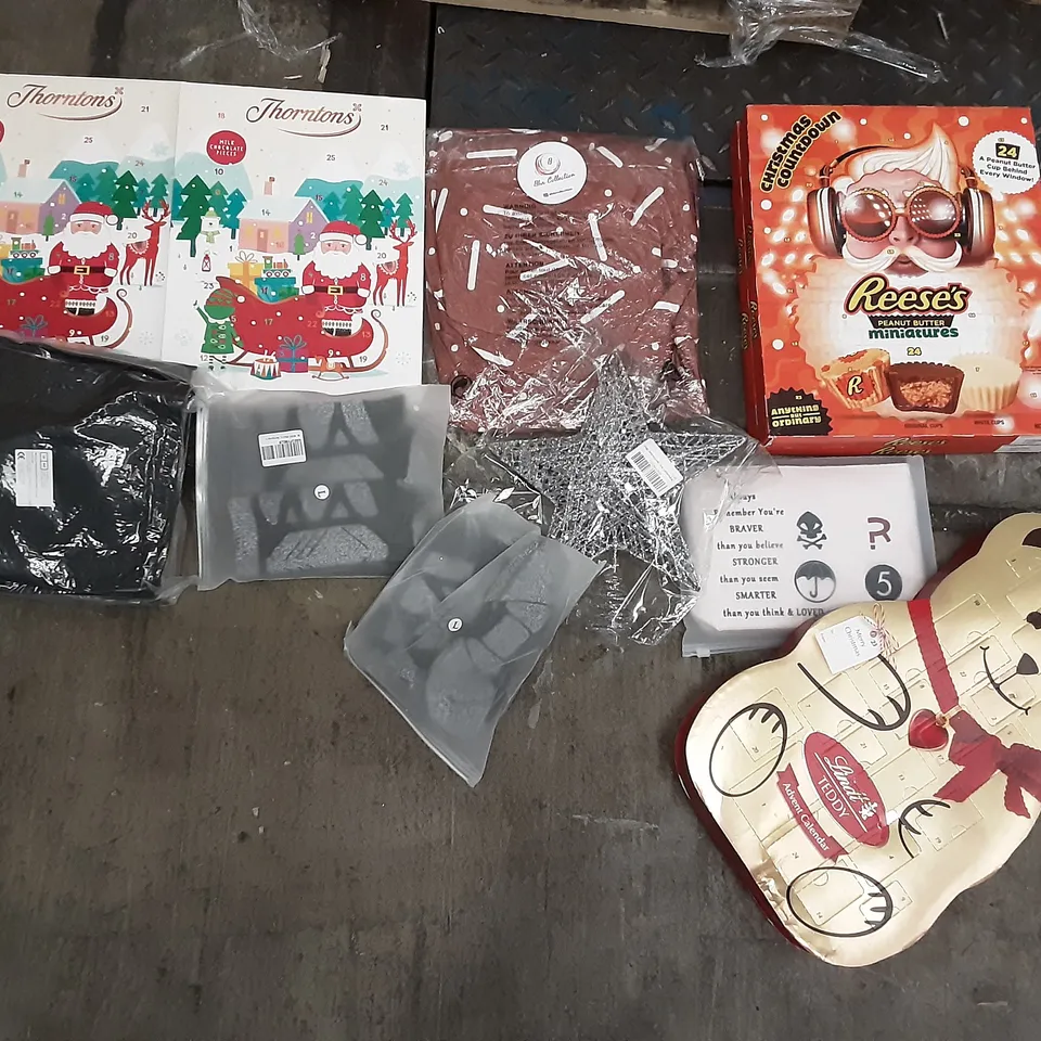 PALLET OF ASSORTED PRODUCTS INCLUDING LINDT TEDDY ADVENT CALENDAR, REESE'S PEANUT BUTTER MINIATURES ADVENT CALENDAR, THORNTONS ADVENT CALENDAR, STAR CHRISTMAS TREE TOPPER, UMBRELLA BAG, PLANT GROW BAG