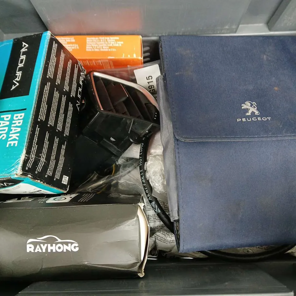 APPROXIMATELY 9 ASSORTED VEHICLE PARTS & ACCESSORIES TO INCLUDE HEATED STEERING WHEEL COVER, AUTOLITE COPPER, SHIMANO CHAIN, ETC