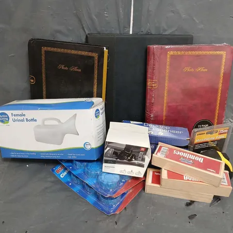 APPROXIMATELY 20 ASSORTED ITEMS TO INCLUDE BUSINESS CARD BOOK, PHOT ALBUM, TAPE DISPENSER, DOMINOES SET, MEASURING TAPE