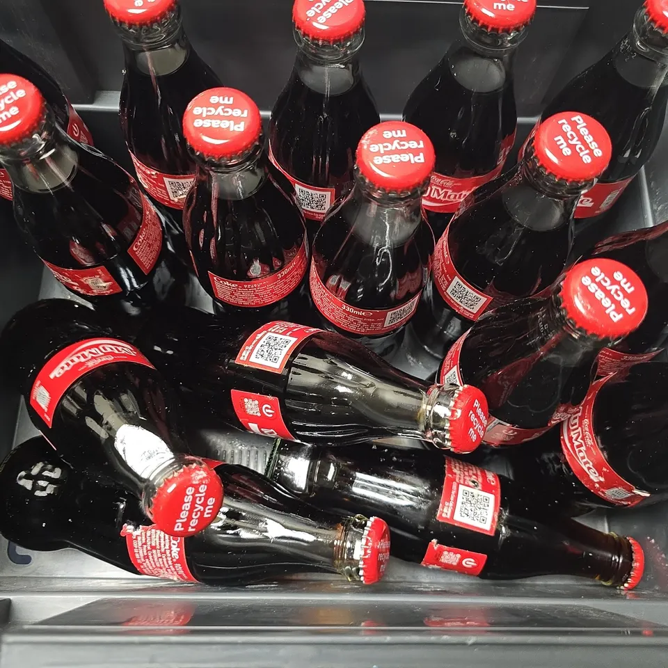 APPROXIMATELY 15 GLASS BOTTLE COCA COLA 330ML 