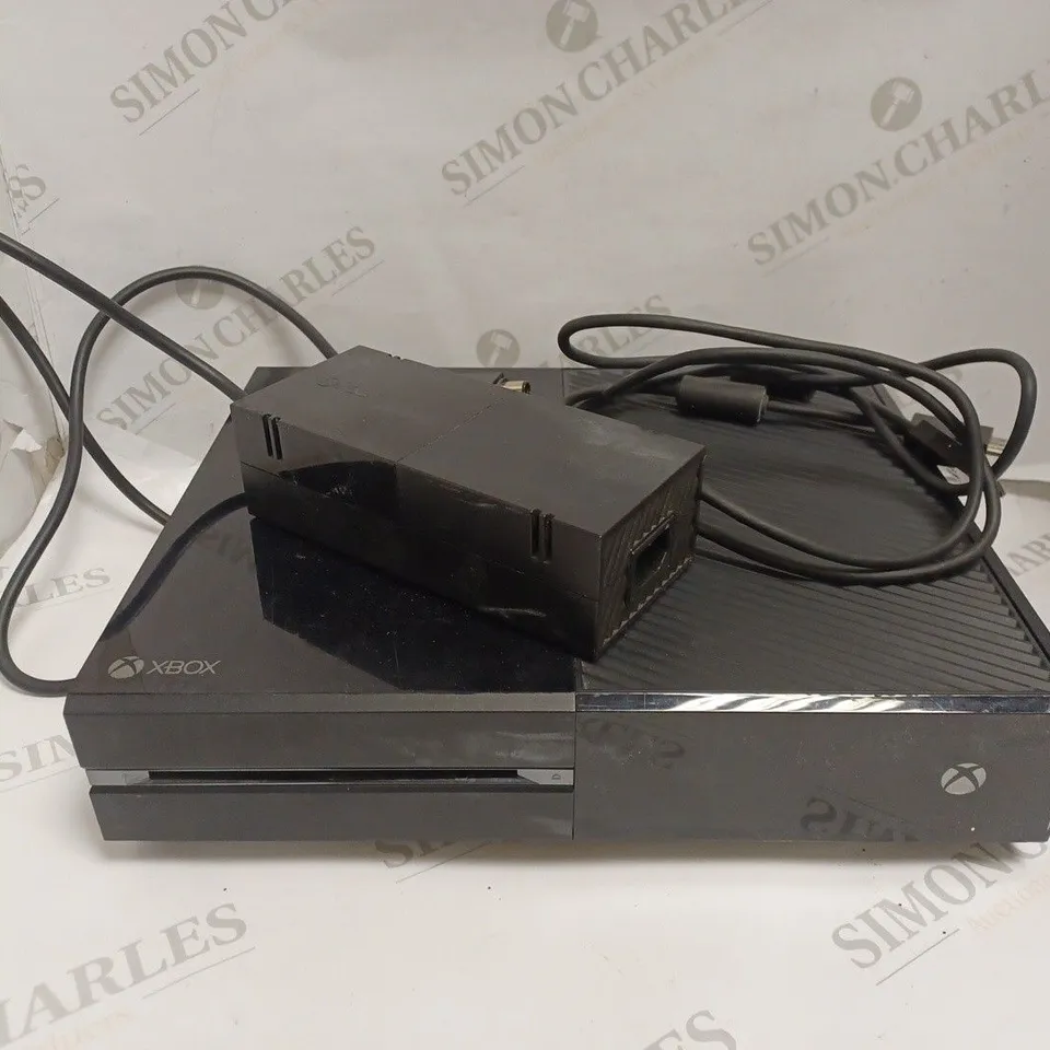 XBOX ONE CONSOLE - BLACK,  WITH 2 CONTROLLERS - WHITE. 