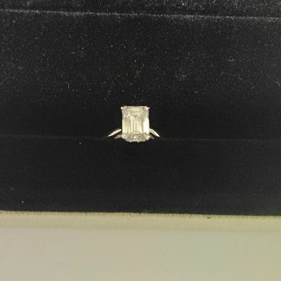 9CT WHITE GOLD SOLITAIRE RING SET WITH A LAB GROWN EMERALD CUT DIAMOND WEIGHING +-2.01CT