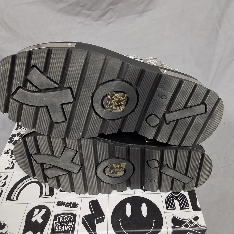 BOXED PAIR OF KOI BORIN HARDWARE PLATFORM BOOTS IN SILVER HOLOGRAM SIZE UK 6