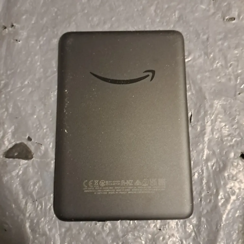 UNBOXED AMAZON KINDLE E-READER - RS23CV