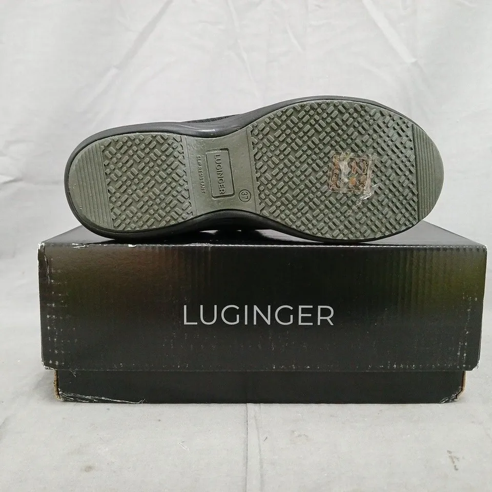 BOXED PAIR OF LUGINGER SHOES IN BLACK SIZE UK 4