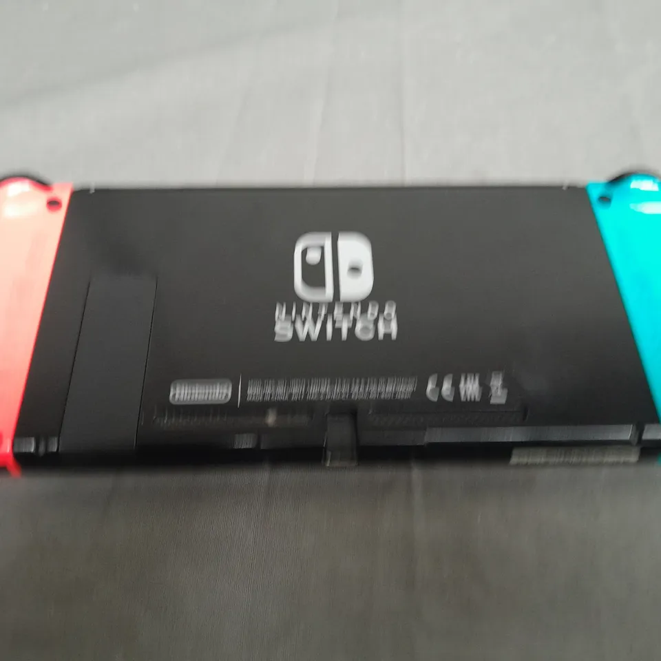 NINTENDO SWITCH AND CHARGING DOCK