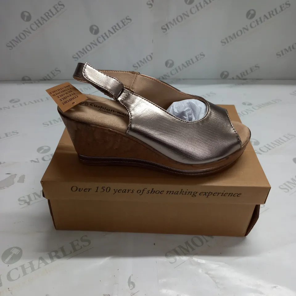 BOXED PAIR OF CUSHION WALK WEDGE HEEL SHOES IN GOLD - SIZE 5
