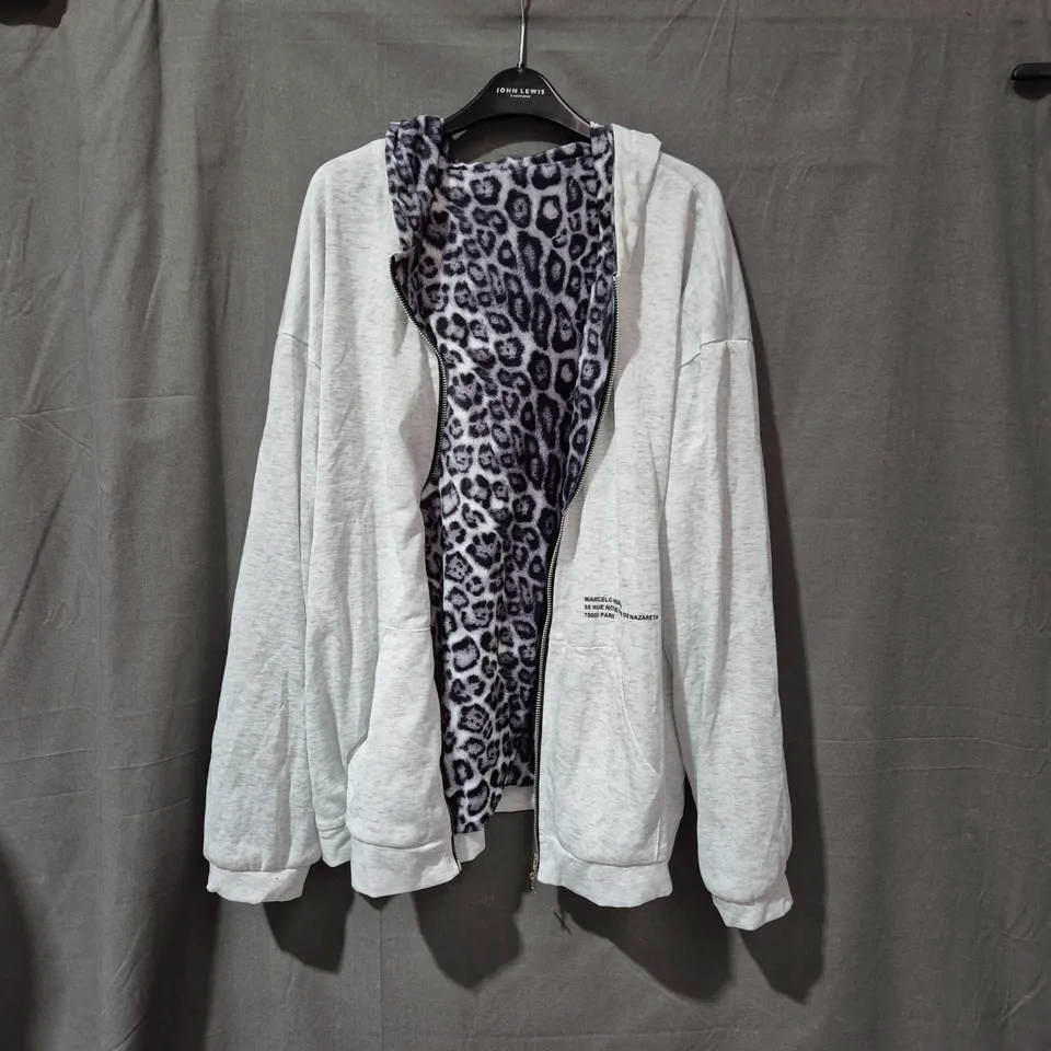 APPROXIMATLY 25 ITEMS INCLUDING TOPS,JACKETS AND SKIRTS