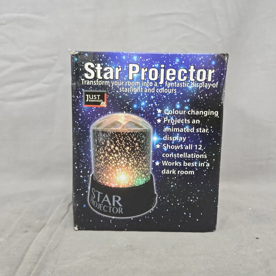 BOX OF APPROXIMATELY 10 ASSORTED HOUSEHOLD ITEMS TO INCLUDE STAR PROJECTOR, ETC - COLLECTION ONLY