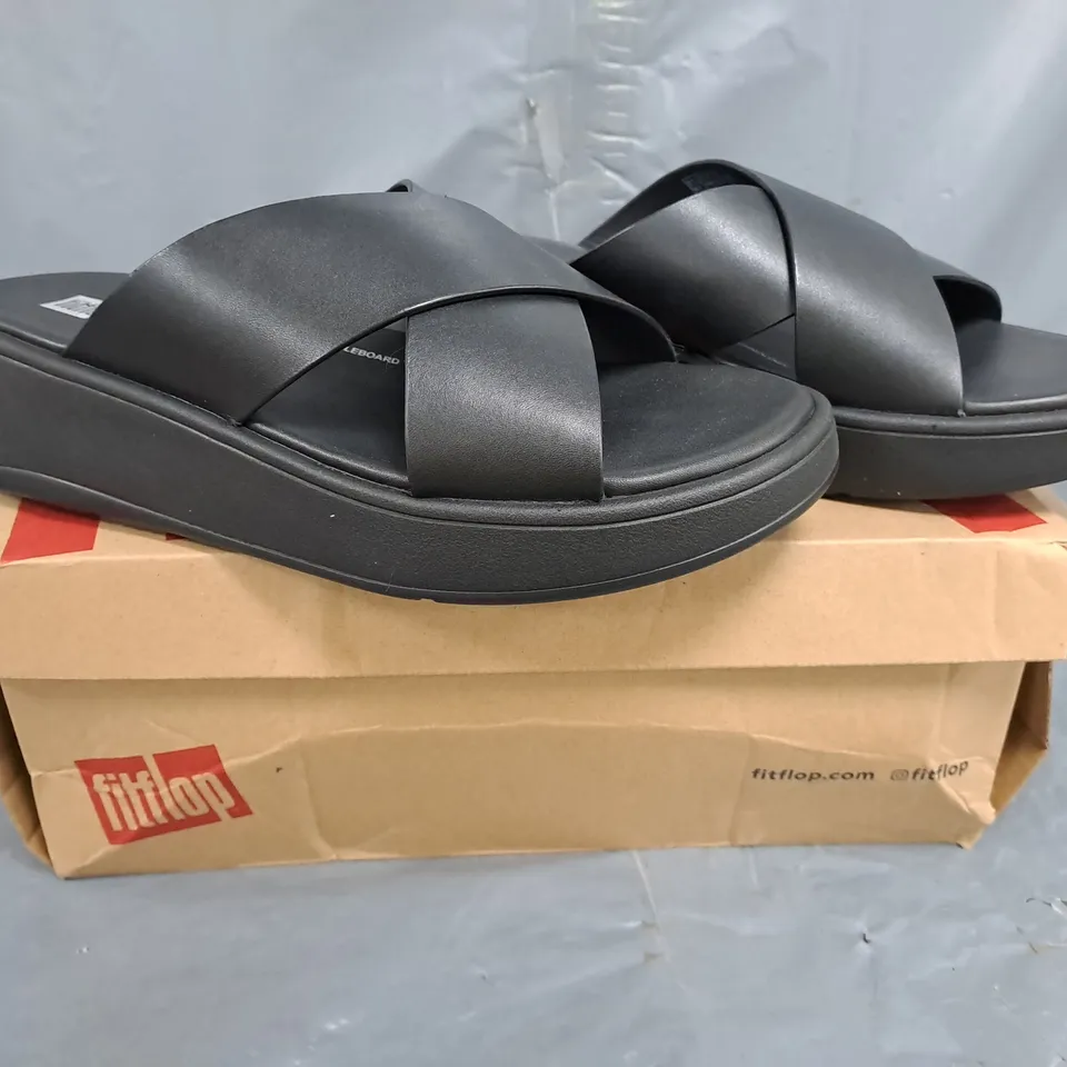 BOXED PAIR OF FITFLOP LEATHER FLATFORM CROSS SLIDES IN BLACK SIZE UK 6