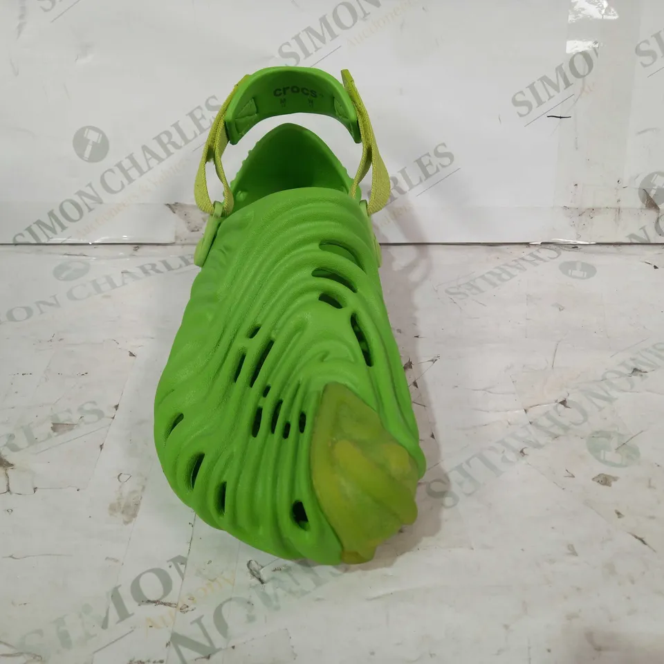 BOXED PAIR OF CROCS SHOES IN GREEN SIZE M10/W12