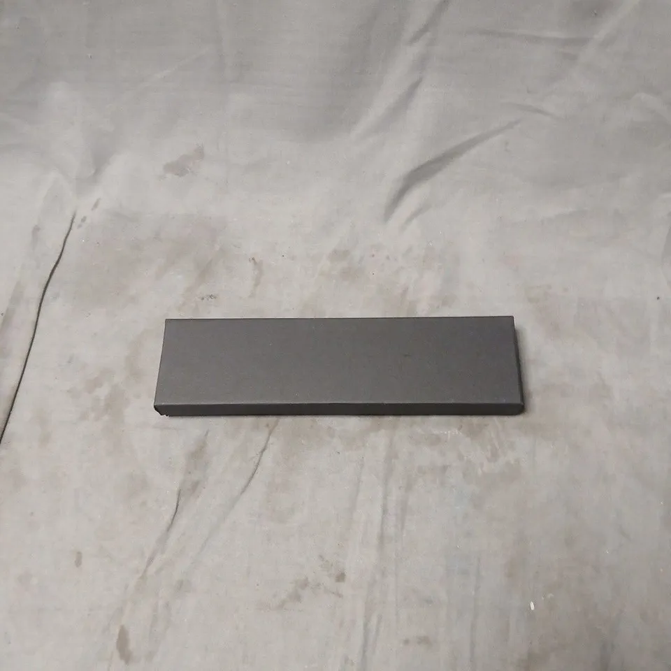 RECTANGULAR WATCH WITH PINK CROCODILE-EMBOSSED LEATHER STRAP AND BLUE CABOCHON CROWN