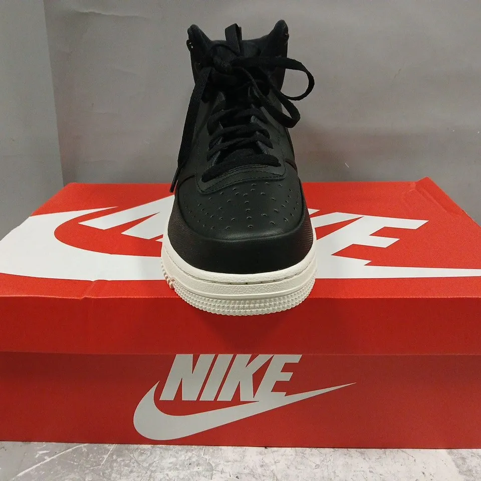 BOXED PAIR OF NIKE COURT VISION MID WNTR SHOES IN BLACK SIZE UK 11