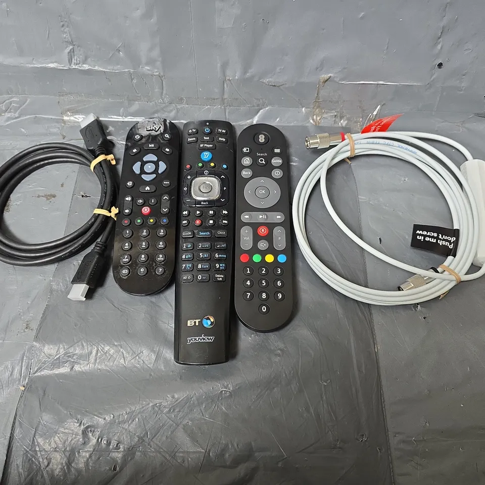 APPROXIMATELY 13 ASSORTED ITEMS TO INCLUDE - EE REMOTE , BT REMOTE , SKY REMOTE ETC