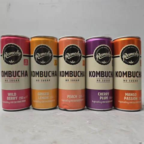 BOX OF APPROXIMATELY 22 KAMBUCHA DRINKS TO INCLUDE - PEACH , CHERRY PLUM , MANGO PASSION ETC