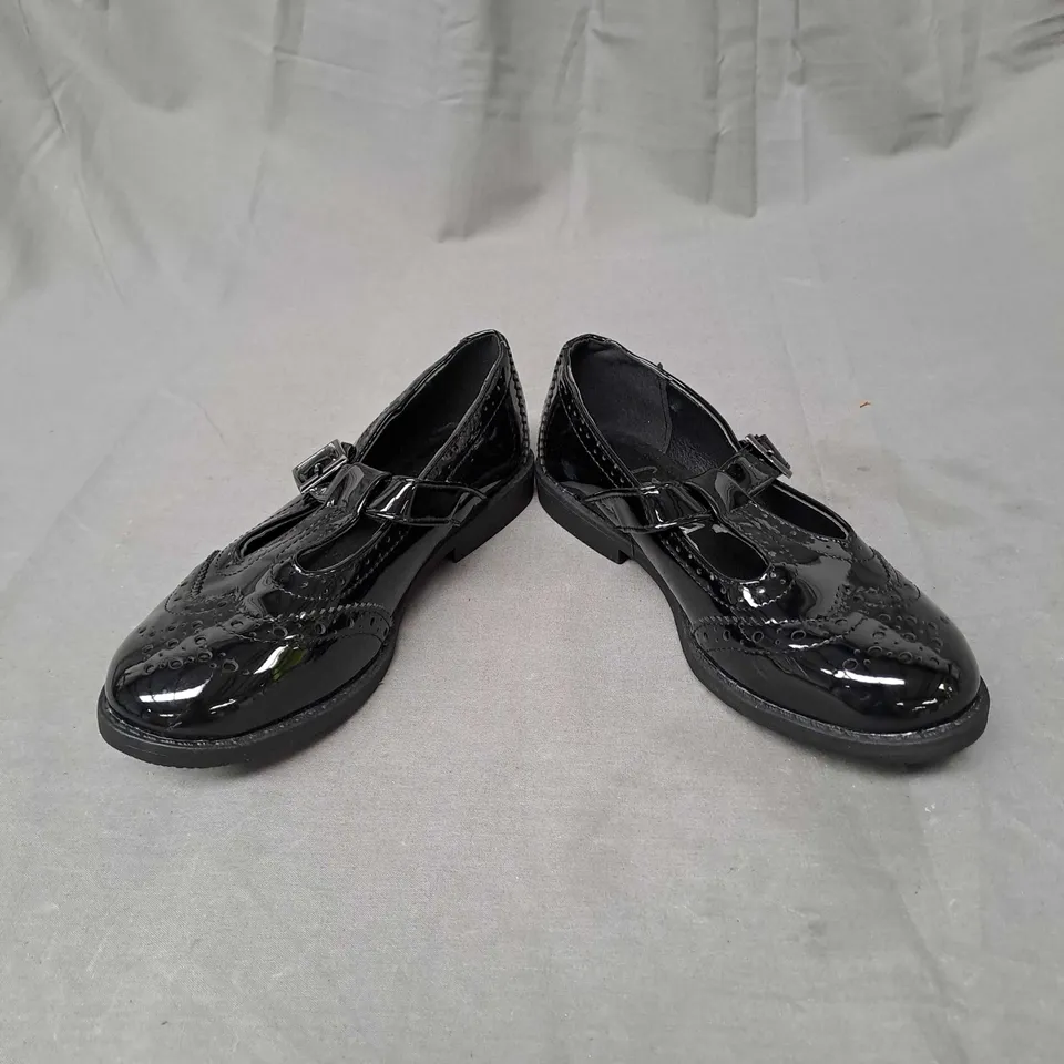 BOX OF APPROXIMATELY 12 PAIRS OF GIRLS SCHOOL SHOES IN BLACK - VARIOUS SIZES