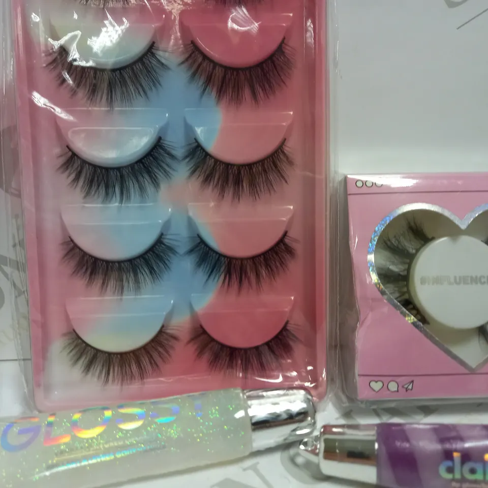 LOT OF APPROX 6 TO INCLUDE LASHES , TWEEZERS , LIPGLOSS , ETC