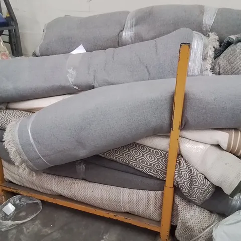 STILLAGE OF APPROXIMATELY 20 QUALITY DESIGNER RUGS