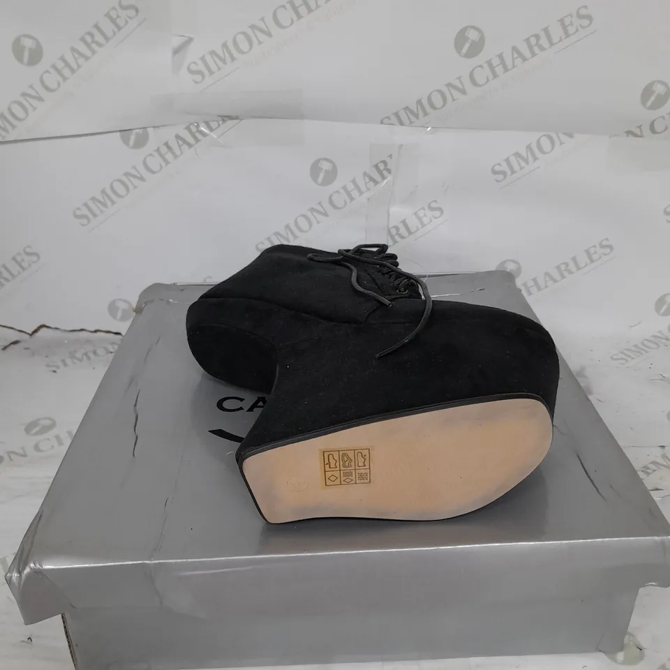 BOXED PAIR OF CASANDRA PLATFORM LACE UP HEELED BOT IN BLACK SUEDE SIZE 3