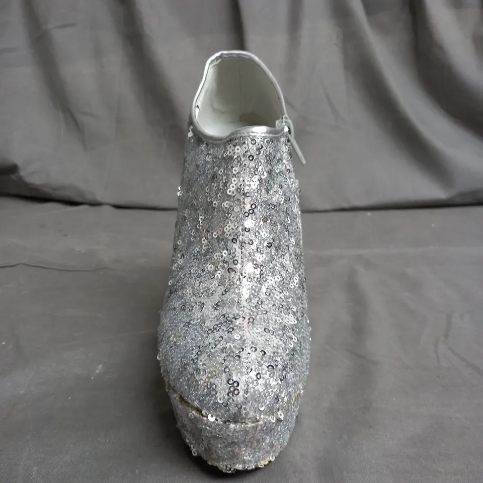 APPROXIMATELY 14 PAIRS OF WOMENS ZIPPED SEQUIN HIGH HEEL SHOES IN VARIOUS SIZES