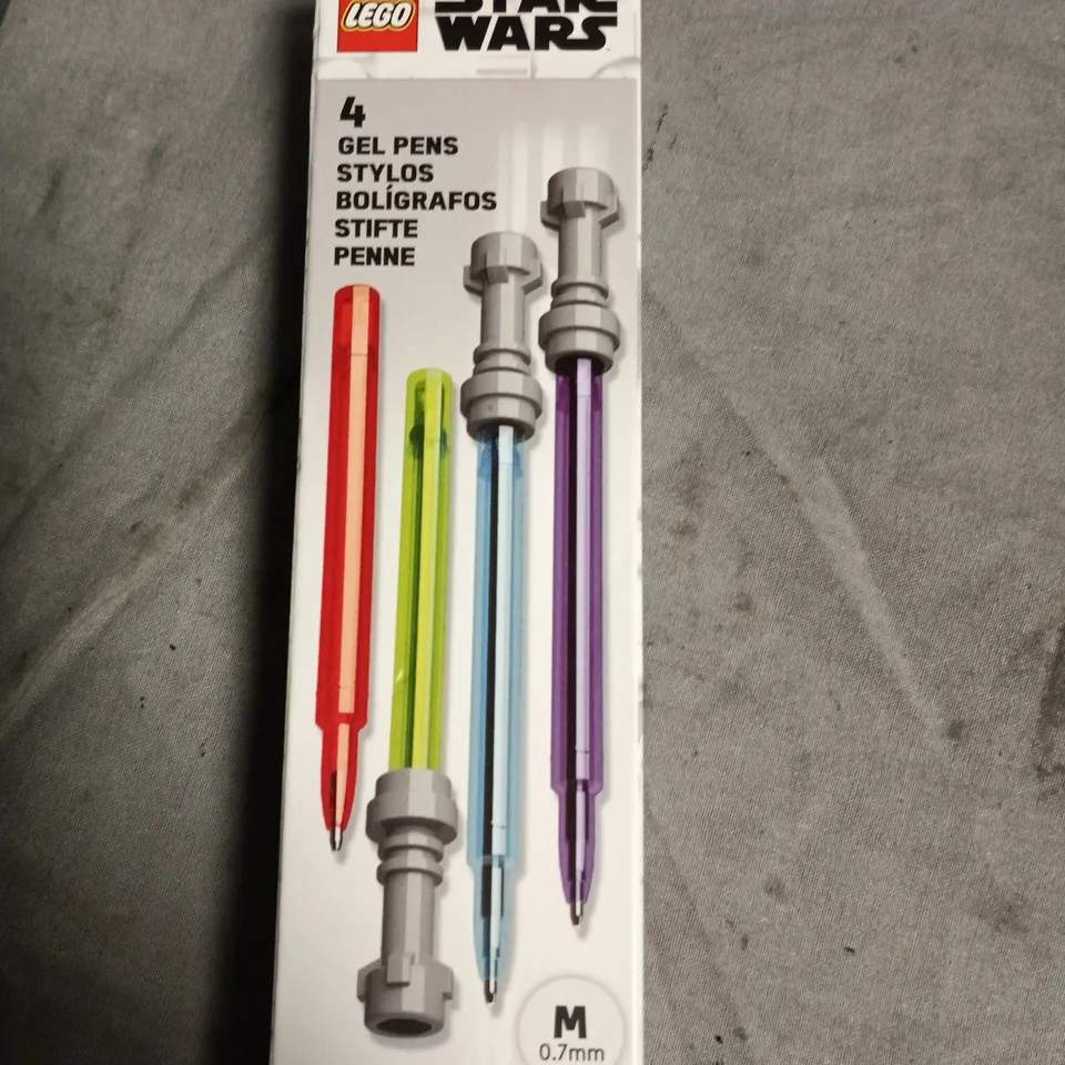 APPROXIMATELY 10 ASSORTED TOYS INCLUDING SENSORY RELAX BARS , LITTLEST PET SHOP FIGURES AND LEGO STAR WARS GEL PENS