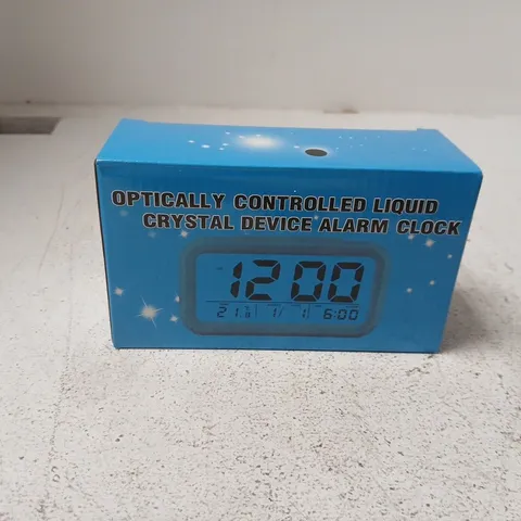 OPTICALLY CONTROLLED LIQUID CRYSTAL ALARM CLOCK (BOXED)