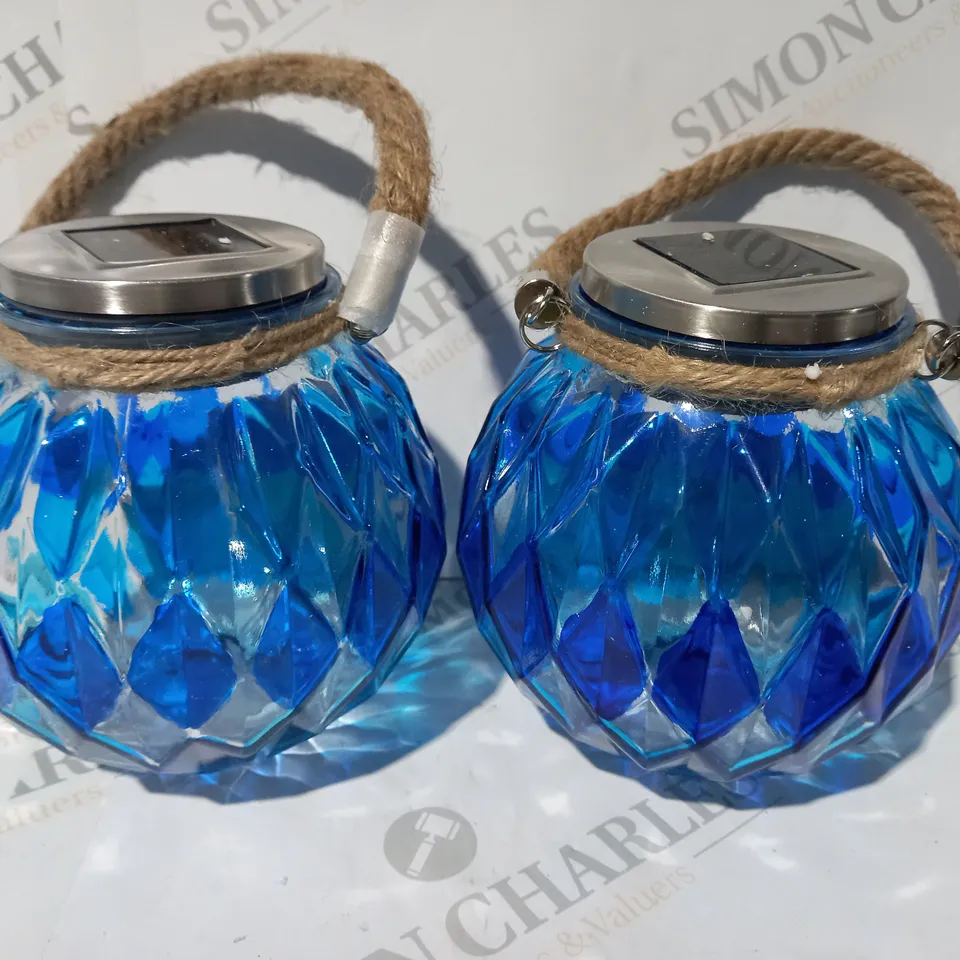 BOXED BELL AND HOWELL SET OF 2 SOLAR JAR LIGHTS