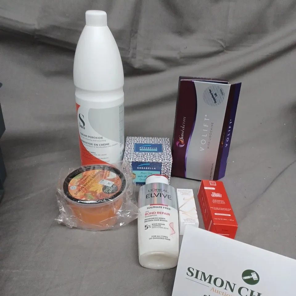 TOTE OF ASSORTED COSMETIC ITEMS TOO INCLUDE , SUGAR SCRUB , ALEPPO SOAP , SERUM , ETC 