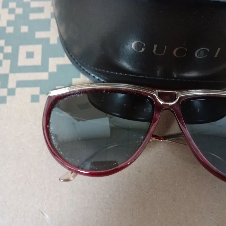 GUCCI SUNGLASSES – BURGUNDY FRAME WITH DARK LENSES