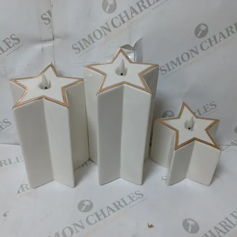 BOXED SET OF 3 PRE-LIT WHITE STAR CANDLES 