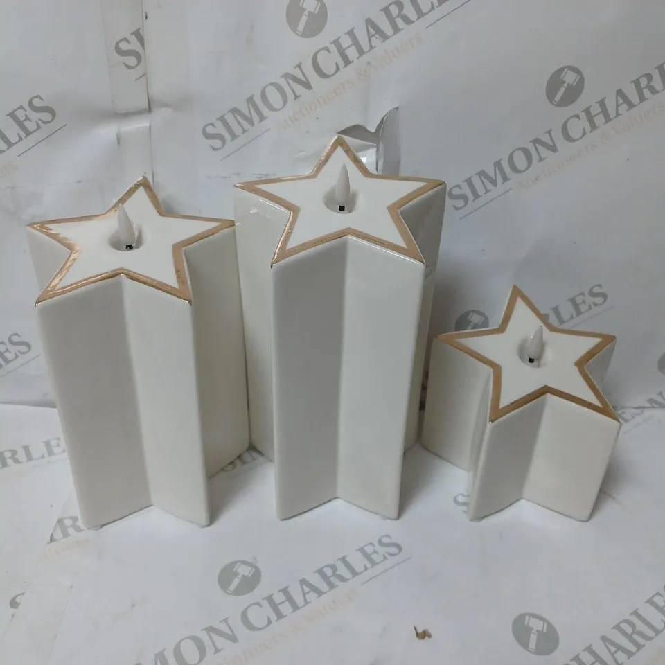 BOXED SET OF 3 PRE-LIT WHITE STAR CANDLES 