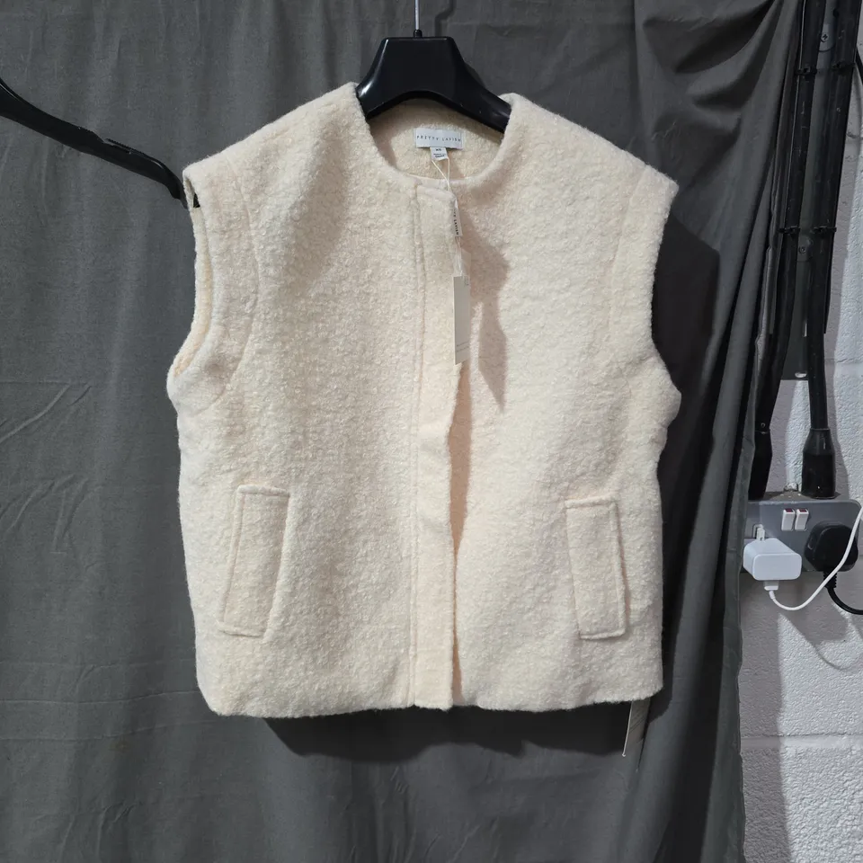 PRETTY LAVISH CREAM SHERPA GILET WITH POCKETS – INCLUDES MATCHING SLEEVES