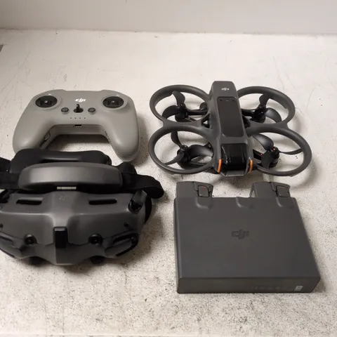 DJI DRONE WITH REMOTE CONTROLLER, GOGGLES & BATTERY BOX