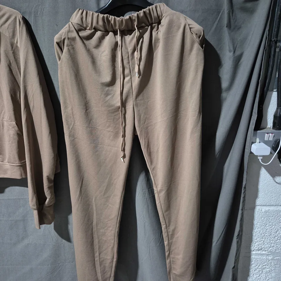 APPROXIMATELY 25 SORTED ITEMS YELLOW ONESIE BLACK TOP AND MATCHING TRACKSUIT   