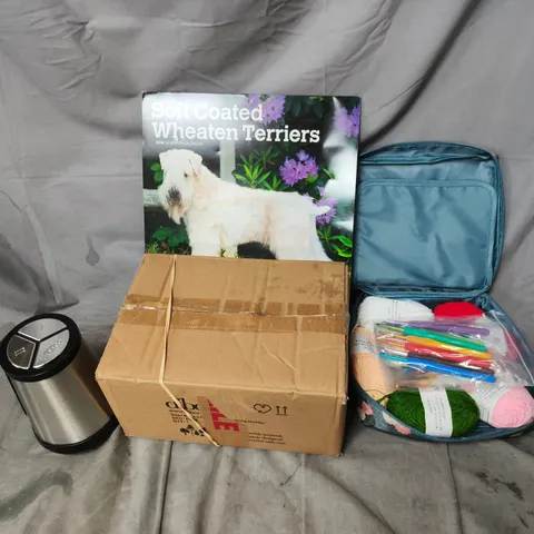 APPROXIMATELY 12 ASSORTED HOUSEHOLD PRODUCTS TO INCLUDE SOFT COATED WHEATEN TERRIERS, CHRISTMAS STOCKING HOLDER, KNITTING TRAVEL KIT, ETC