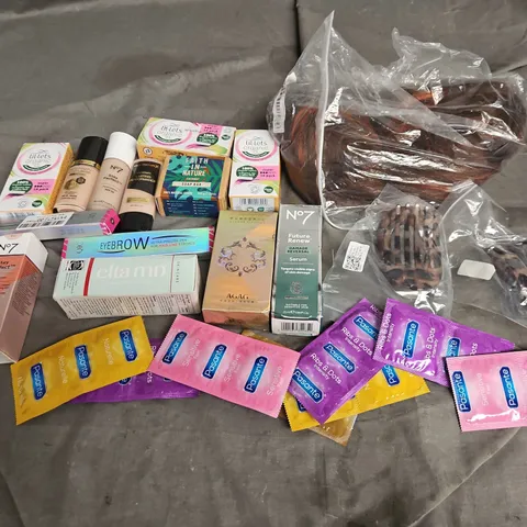 APPROXIMATELY 12 ASSORTED HEALTH & BEAUTY PRODUCTS TO INCLUDE CONDOMS, EYEBROW PEN, AND SOAP BAR ETC.