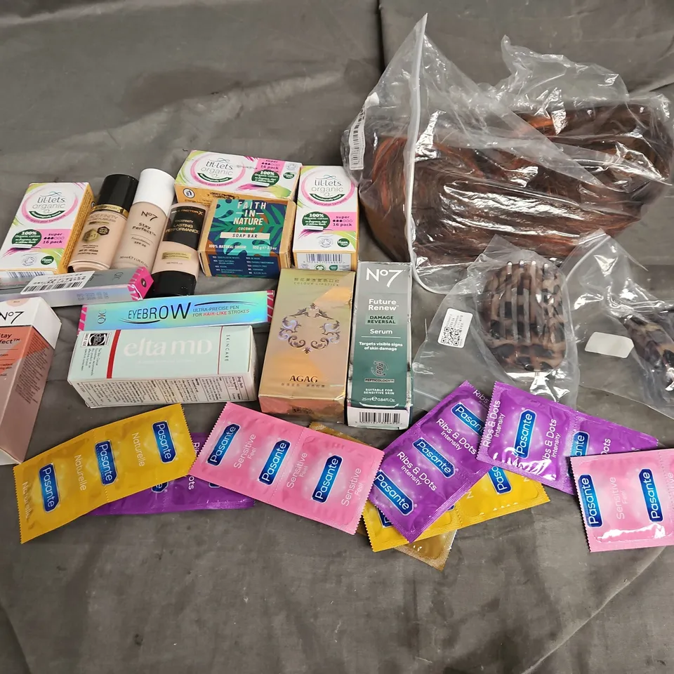 APPROXIMATELY 12 ASSORTED HEALTH & BEAUTY PRODUCTS TO INCLUDE CONDOMS, EYEBROW PEN, AND SOAP BAR ETC.