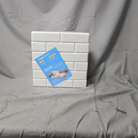WHITE STYROFOAM INSULATION TILES PACKAGED BLOCK WITH BLUE INSTRUCTION CARD
